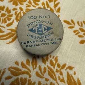 TC vintage pinch on paper fasteners produced by Burnap Meyer in Kansas City MO
